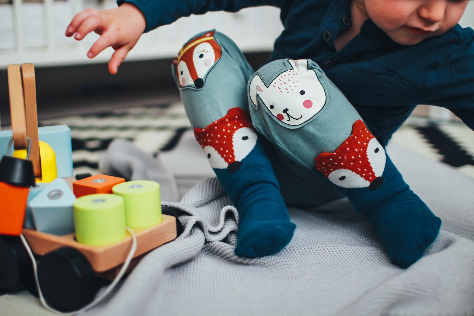 boy playing with toys