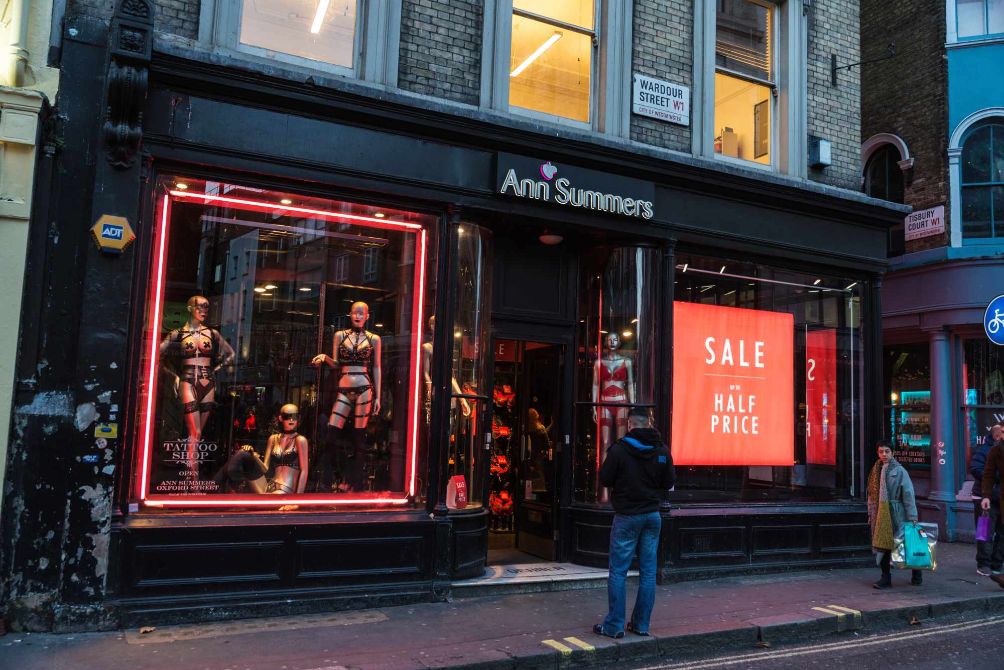 an ann summers shop with a sale sign in the window