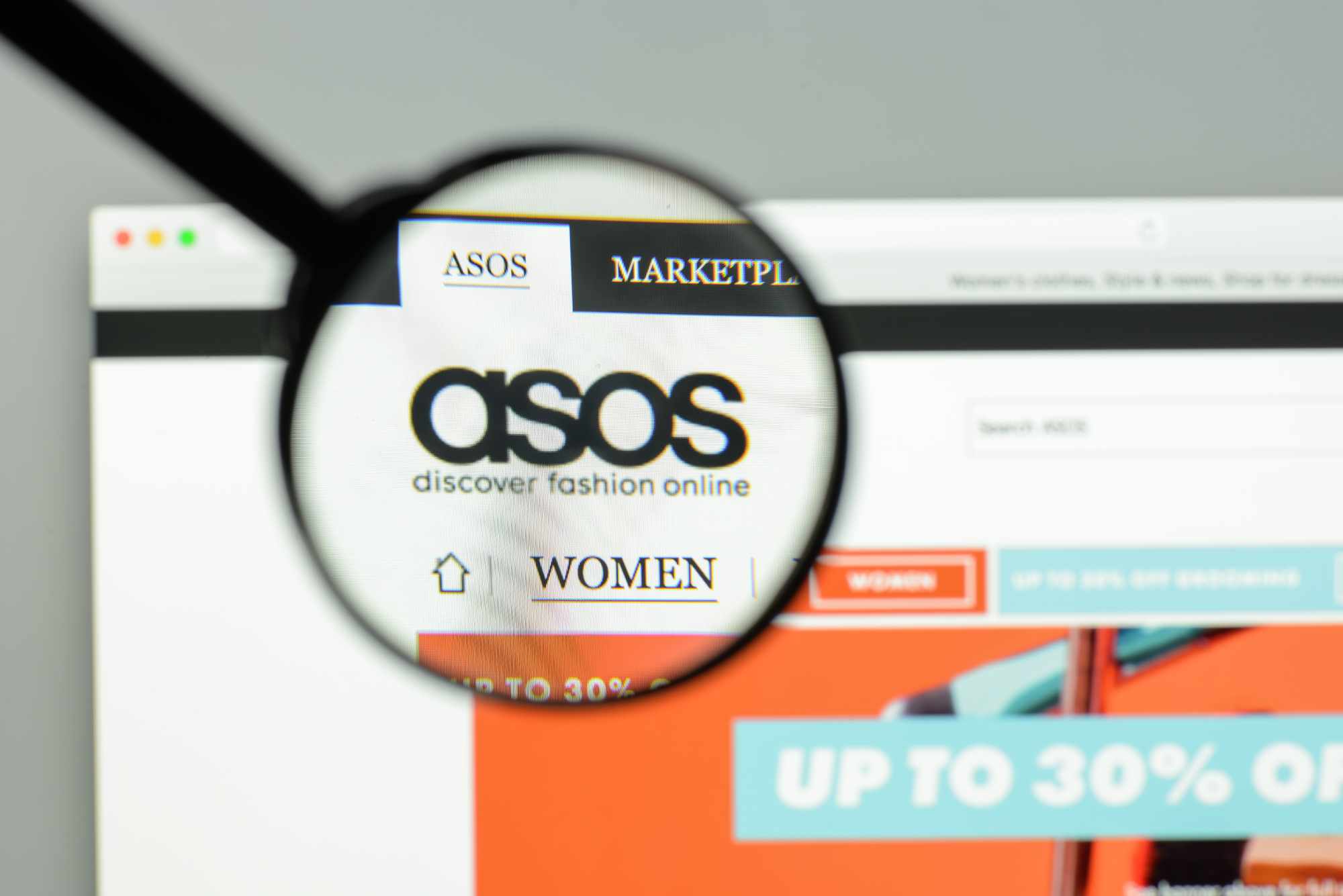 asos website with a magnifying glass over the asos logo