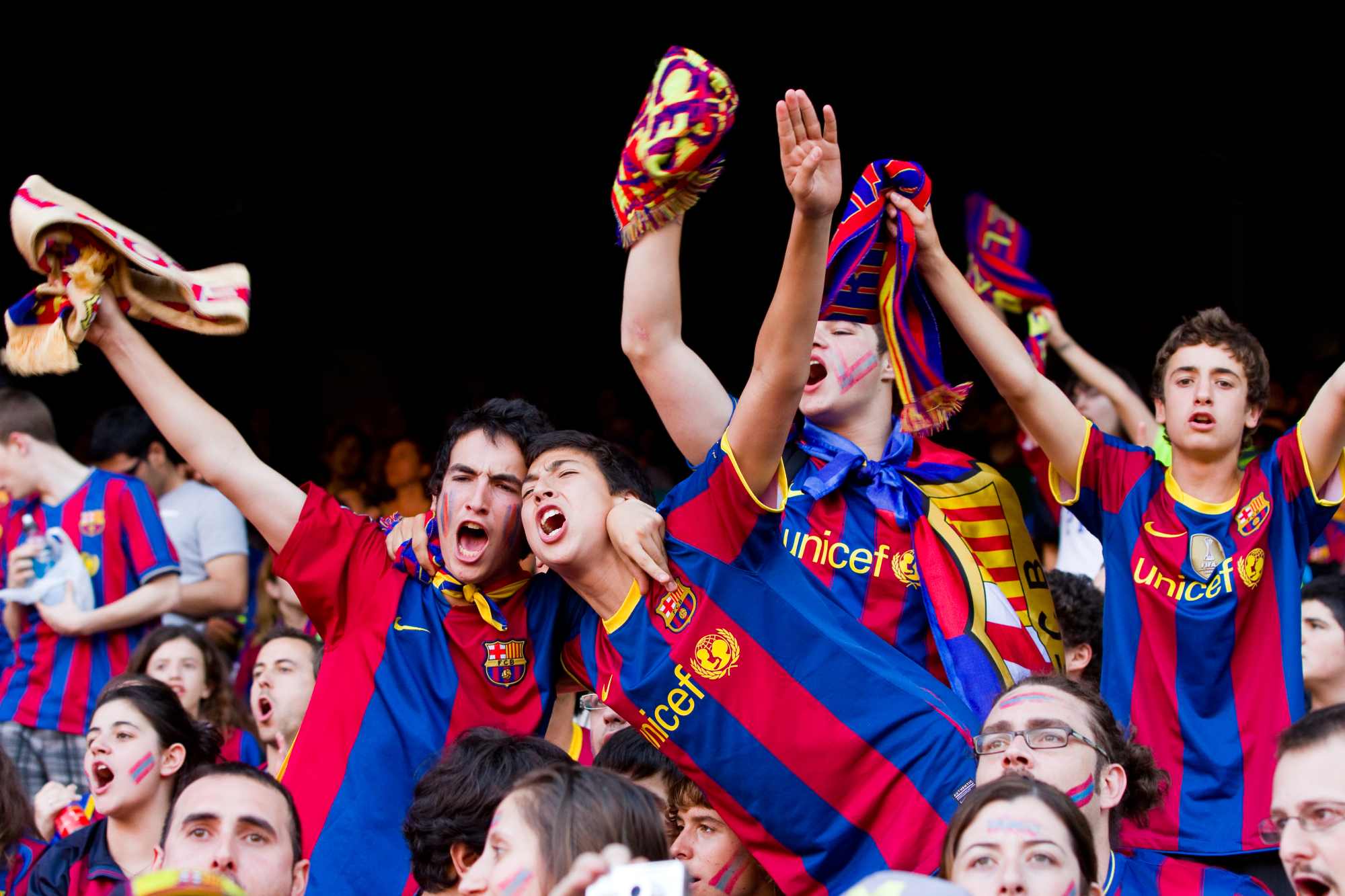 Barcelona football fans wearing Barca merch