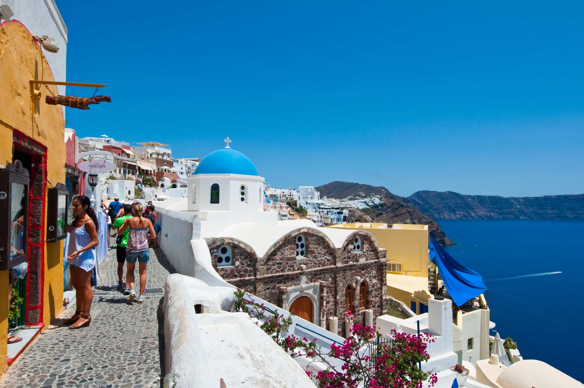 tourists shopping in Santorini Greece