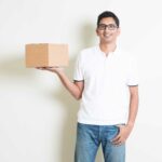 smiling indian courier