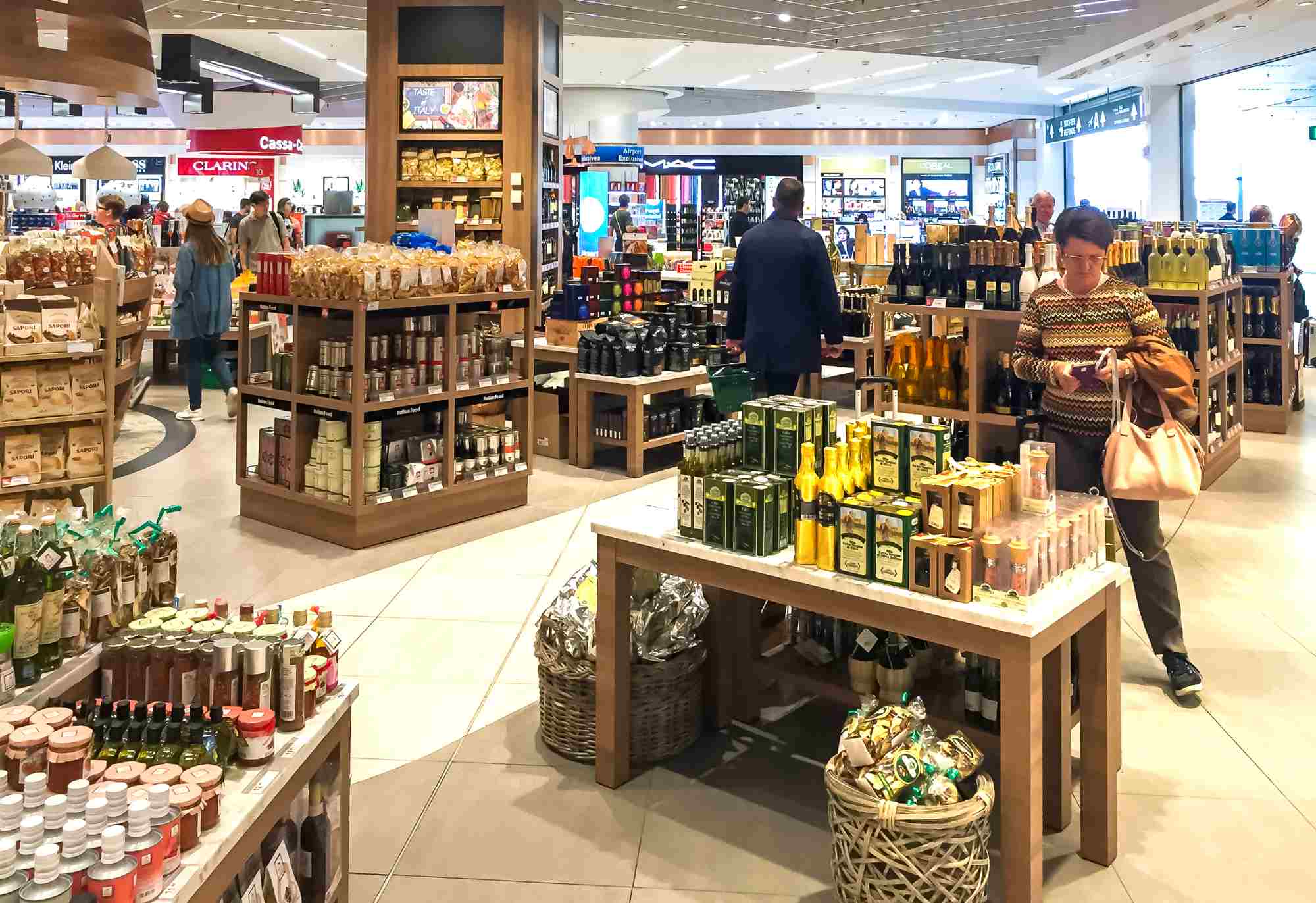 Italian products, such as olive oil, at the duty free section of an airport