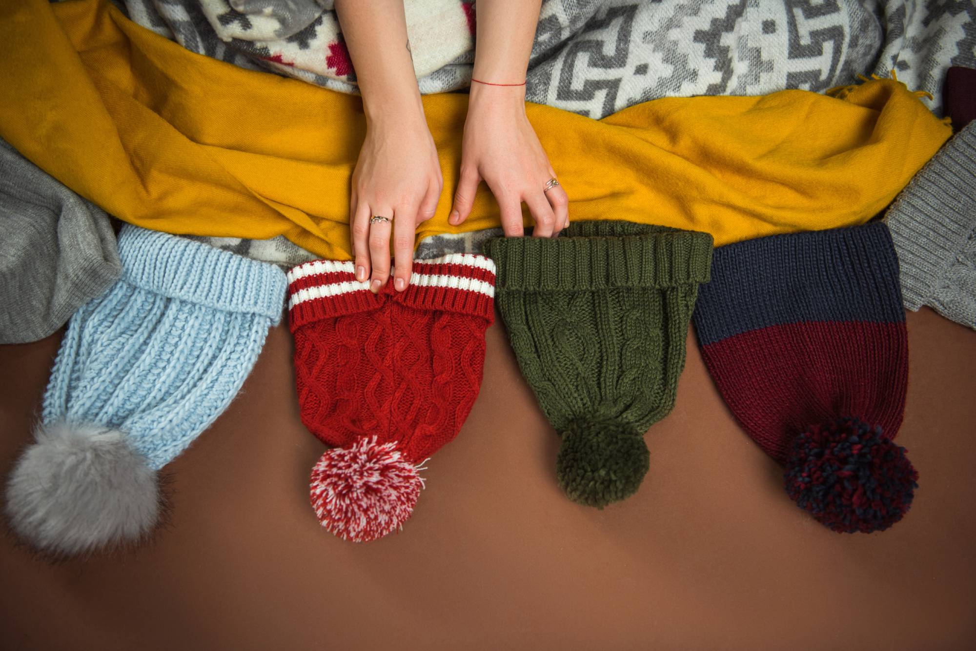 a collection of winter hats